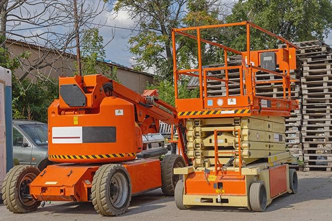 warehouse worker operating a heavy-duty forklift in Arlington TN